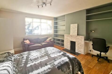Bright and inviting master bedroom featuring a ...
