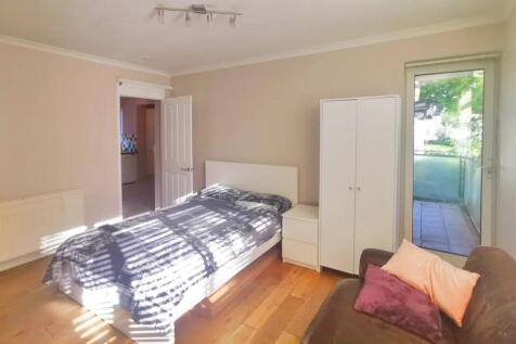 Bright and inviting double bedroom featuring a ...