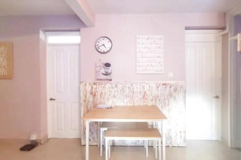 Bright and tidy communal lounge area featuring ...
