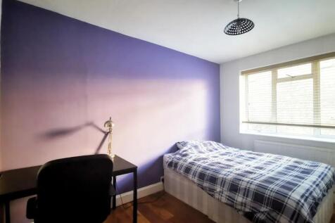 Bright and neat single bedroom featuring a comf...