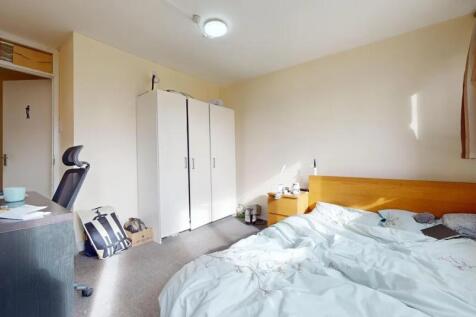 Bright and inviting double bedroom featuring a ...