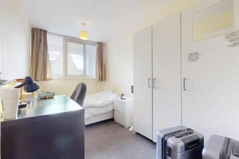 Bright and neat single bedroom featuring a stud...