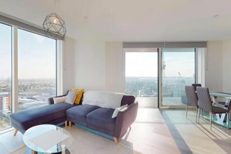 Bright and spacious living room with floor-to-c...