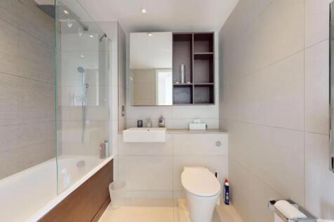 A modern and well-maintained bathroom featuring...