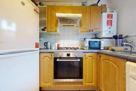 Bright and functional kitchen featuring wooden ...