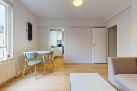 Bright and inviting living room featuring a mod...