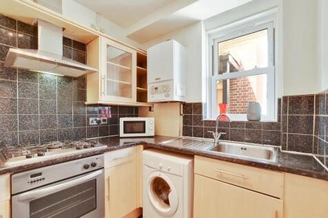 Bright and functional kitchen featuring modern ...