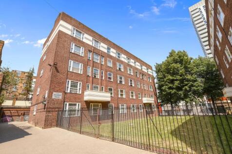 A well-maintained brick residential building wi...