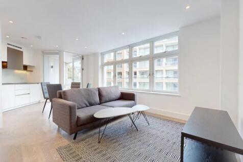 Bright and modern living room with large window...