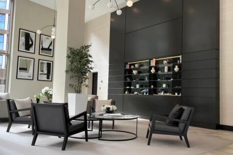 A stylish and spacious reception area featuring...