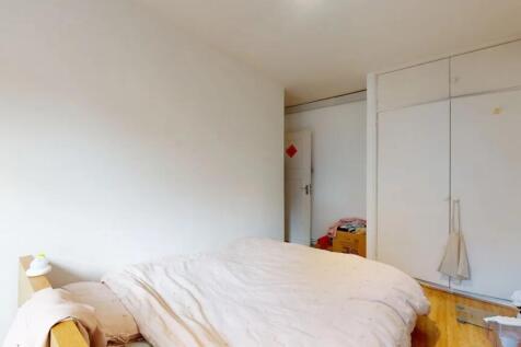 Bright and cozy double bedroom featuring clean ...