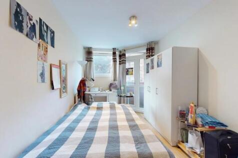 A neat and bright single bedroom featuring a st...