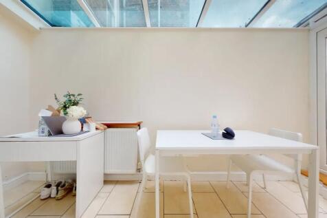 Bright communal workspace featuring a modern wh...