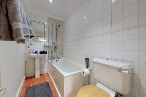 A clean and well-maintained bathroom featuring ...