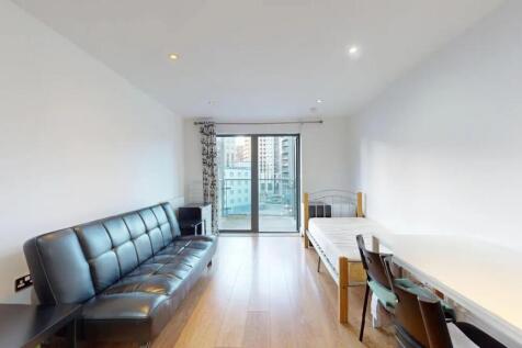 Bright and modern single bedroom featuring a sl...