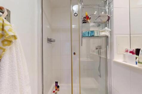 A modern, well-maintained bathroom featuring a ...