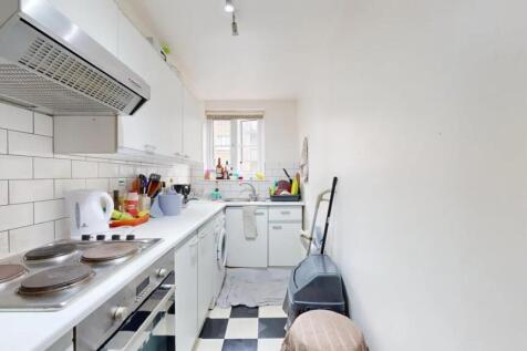 Bright and functional kitchen featuring a class...