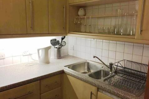 A compact and well-maintained kitchen featuring...