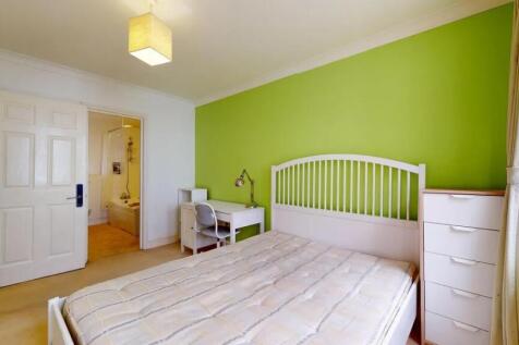 Bright and inviting master bedroom featuring a ...