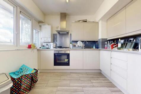 Bright and modern kitchen space featuring ample...