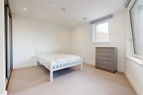 A bright and tidy double bedroom featuring a wh...