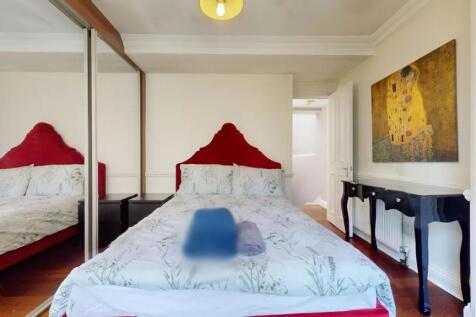 Bright and elegant double bedroom featuring a s...