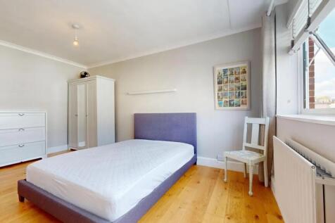 Bright and airy double bedroom featuring clean ...