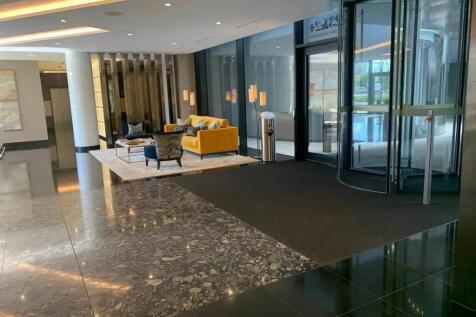 A stylish and modern building reception area fe...