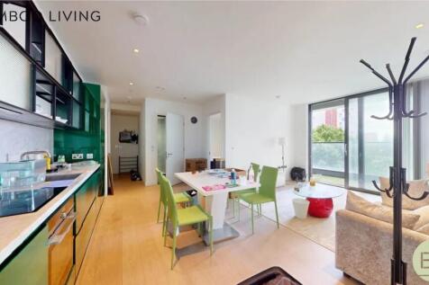 Bright and modern living room with an open-plan...
