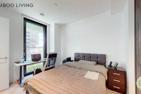 A modern double bedroom featuring a comfortable...