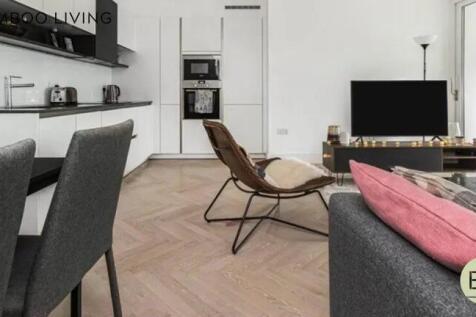 A sleek and modern living room featuring stylis...