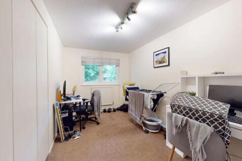 A bright and practical single bedroom featuring...
