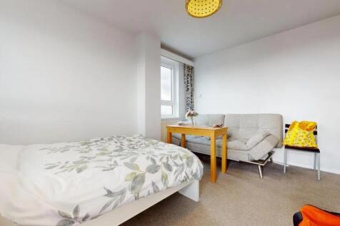 A bright and tidy double bedroom featuring a co...