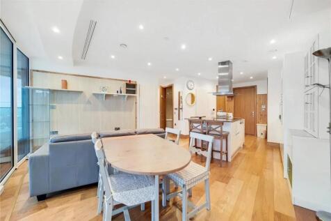 Bright and modern open-plan living area featuri...