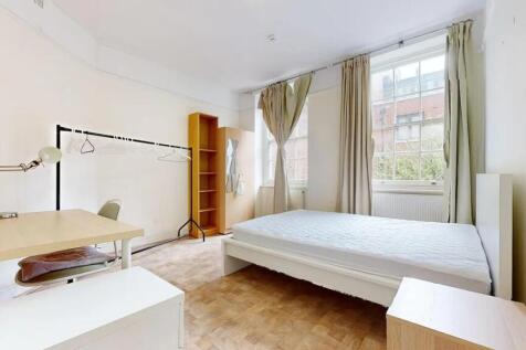 Bright and airy double bedroom featuring large ...