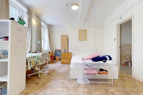 Bright and airy double bedroom featuring large ...