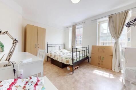 Bright and airy double bedroom featuring a stur...