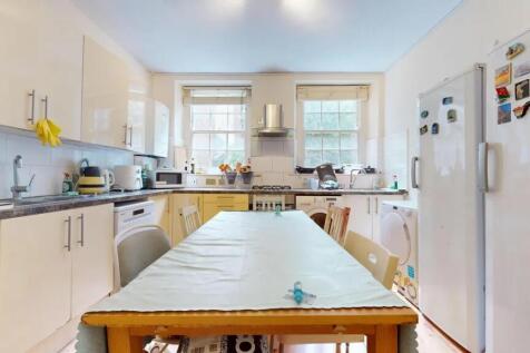 Bright and functional kitchen with ample counte...