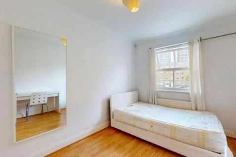 Bright and tidy single bedroom featuring a larg...
