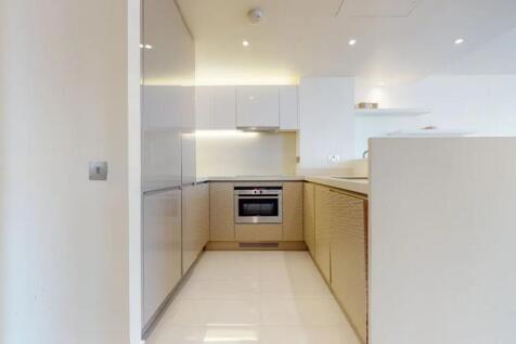 Modern kitchen featuring sleek cabinetry, integ...