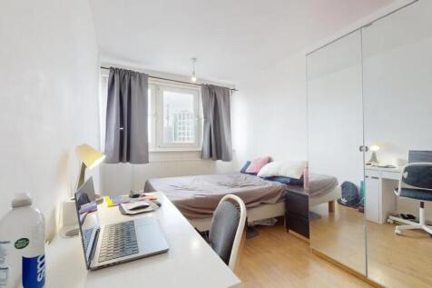 Bright and tidy double bedroom featuring a comf...