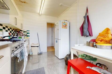 Bright kitchen with modern appliances and a cle...