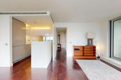 Bright and contemporary living room featuring s...