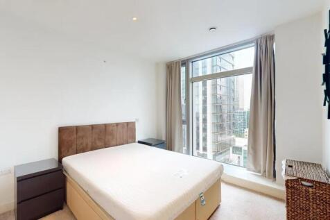 Bright double bedroom with a comfortable bed, l...
