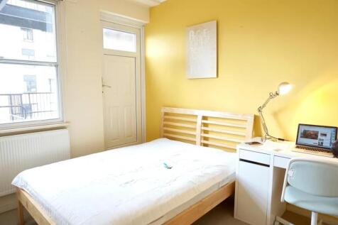 Bright and inviting master bedroom featuring a ...