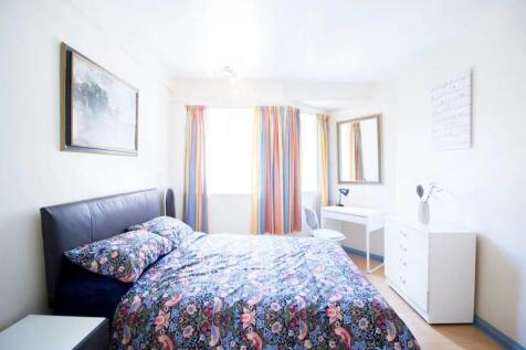 Bright and inviting master bedroom featuring a ...