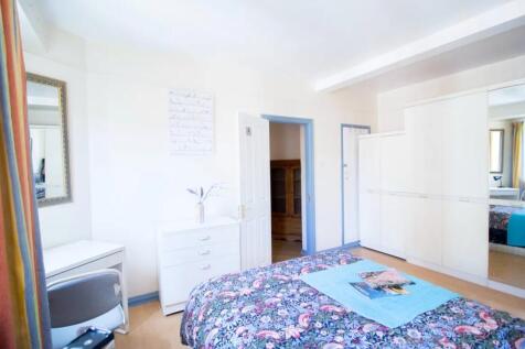 Bright and inviting double bedroom featuring a ...