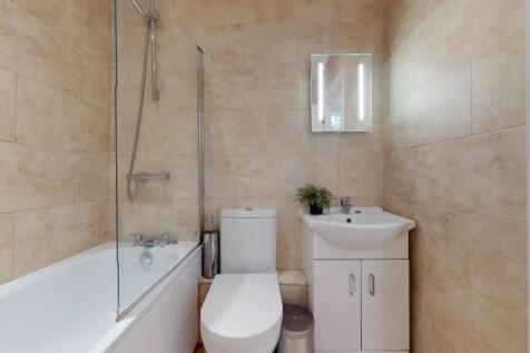 A modern and well-maintained bathroom featuring...