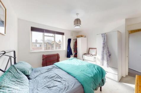 Bright and airy double bedroom featuring a larg...