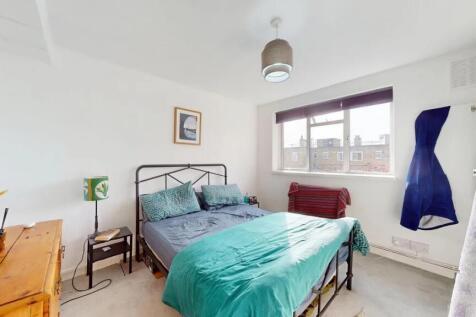Bright and inviting double bedroom featuring a ...